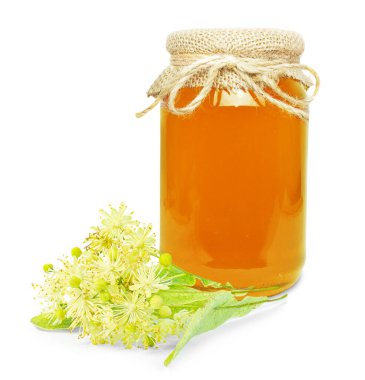 Beyaz arka planda izole edilmiş kavanozdaki ıhlamur balı.