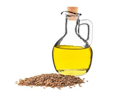 Beyaz arka planda izole edilmiş şişedeki kahverengi keten tohumu yağı.