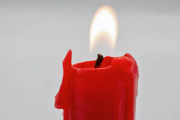 Burning Small Red Candle Stub Closeup White Background — Stock Photo, Image