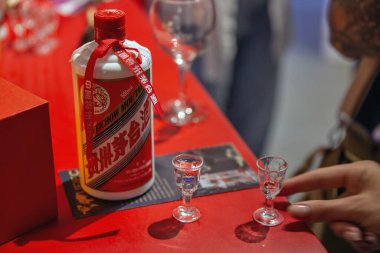 Kyiv, Ukraine - June 06, 2021: Maotai or Moutai hard drink booth at Food and Wine Fest. It is a brand of baijiu, a distilled Chinese liquor made in the town of Maotai in Guizhou. clipart