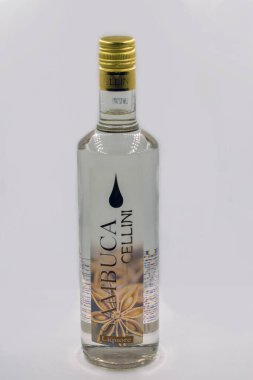 Kyiv, Ukraine - October 02, 2021: Studio shoot of a bottle of Sambuca Cellini, a sweet anise flavored Italian liquor closeup on white.