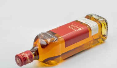 Kyiv, Ukraine - May 26, 2022: Studio shoot of John Barr blended Scotch Whisky bottle against white. It is a brand of Whyte and Mackay company producing alcoholic beverages.