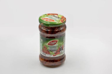 Kyiv, Ukraine - June 01, 2022: Studio shoot of Sottile Gusto dried tomatoes jar closeup on white.
