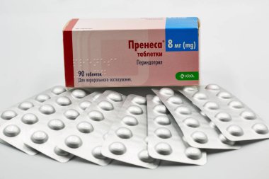 Kyiv, Ukraine - March 22, 2024: Antihypertensive drug Prenessa by KRKA, generic perindopril box and blisters closeup against white. Krka is international pharmaceutical company. clipart