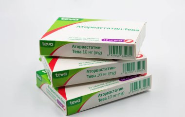 Kyiv, Ukraine - March 22, 2024: Atorvastatin generic drug boxes by Teva closeup against white. It is a medication used to prevent cardiovascular disease and treat abnormal lipid levels. clipart