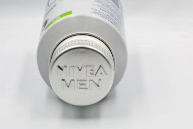 Kyiv, Ukraine - September 02, 2022: Studio shoot of Nivea Men after shave balm closeup on white. Nivea is a German personal care brand that specializes in skin and body care. clipart