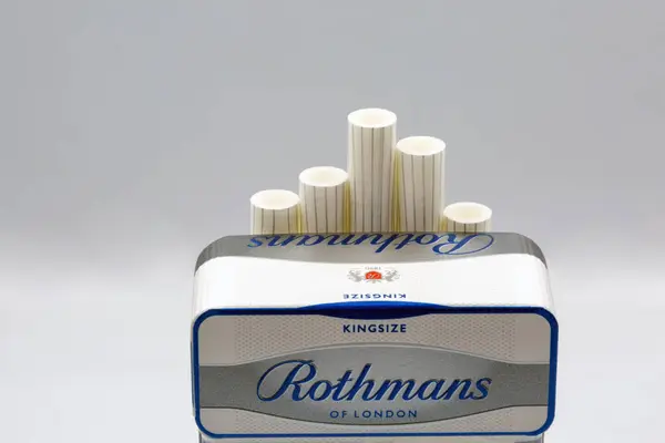 stock image Kyiv, Ukraine - August 05, 2022: A pack of Rothmans cigarettes closeup on white. Rothmans International PLC was a British tobacco manufacturer, it was acquired by British American Tobacco in 1999.