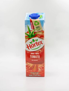 Kyiv, Ukraine - May 26, 2022: Studio shoot of Hortex tomato juice package closeup on white. Hortex is one of the world's largest producers of juices, frozen fruits and vegetables.
