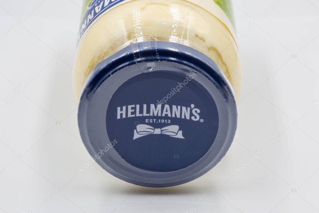 Kyiv, Ukraine - September 24, 2022: Studio shoot of Hellmanns Mayonnaise Original jar lid closeup on white. It is a brand name that used for the line of mayonnaise, ketchup, mustard, sauce and other.