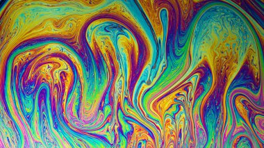 Işık yansıtan bir arkaplan oluşturan soyut sabun köpüğü