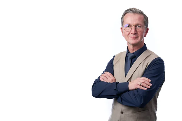 Smiling businessman portrait. Successful business man wearing light suit while standing against at isolated white background.