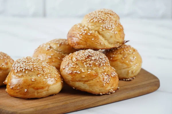 Non sweet bakery. Baked round buns with Sesame seed