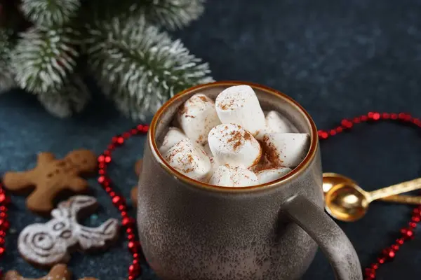 A cup of hot cocoa with white marshmallows in a  mug. Christmas and new year. Winter holidays.