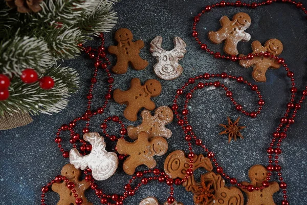 Swedish ginger biscuit shaped in funny form of thins cookies with cinnamon and cloves. New Year concept
