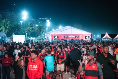 Rio de Janeiro (RJ), 16 / 06 / 2025 - FAN ZONE FIFA - FIFA Dünya Kulüpler Kupası 2025 Fan Zone Copacabana sahilinde Flamengo taraftarlarıyla.                 