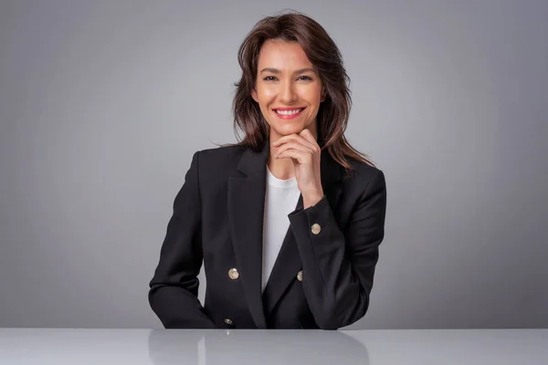 Portrait Attractive Businesswoman Wearing Black Blazer While Sitting Isolated Background — Foto Stock