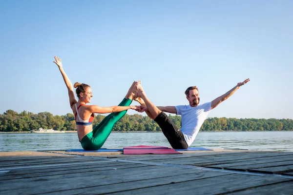 Shot Woman Man Doing Acrobatic Yoga Outdoor Full Length Couple Stock Photo