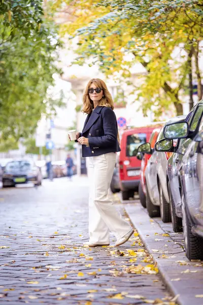 Full Length Middle Aged Woman Blonde Hair Walking Street City Stock Image