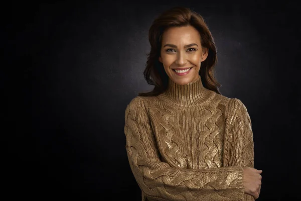 Studio Portrait Brunette Haired Woman Wearing Gold Sweater Smiling Isolated Stock Picture
