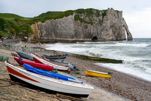 stock image Etretat, France - Jun 15 2024: view of the beach and Falaise d'Aval in on a rainy day in spring