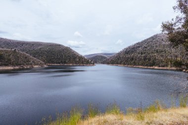 Tumut Pond Dam from the Tumut River forming as part of the Snowy Mountains Hydro Electric power scheme in New South Wales, Australia