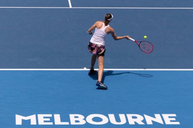 MELBOURNE, AUSTRALIA - JANUARY 22: Elena Rybakina of Russia plays Iga Swiatek of Poland on day 7 action of the 2023 Australian Open at Melbourne Park on January 22, 2023 in Melbourne, Australia.