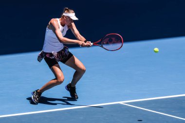 MELBOURNE, AUSTRALIA - JANUARY 22: Elena Rybakina of Russia plays Iga Swiatek of Poland on day 7 action of the 2023 Australian Open at Melbourne Park on January 22, 2023 in Melbourne, Australia.