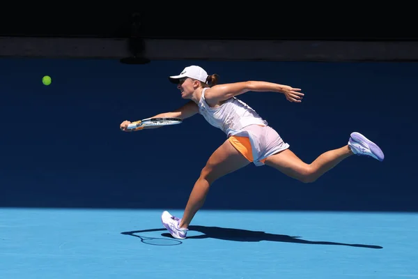 MELBOURNE, AUSTRALIA - JANUARY 22: Iga Swiatek of Poland plays Elena Rybakina of Russia on day 7 action of the 2023 Australian Open at Melbourne Park on January 22, 2023 in Melbourne, Australia.