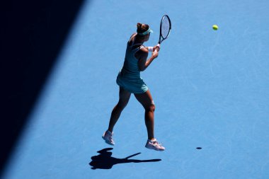 MELBOURNE, AUSTRALIA - JANUARY 23: Magda Linette of Poland plays Caroline Garcia of France on day 8 action of the 2023 Australian Open at Melbourne Park on January 23, 2023 in Melbourne, Australia.