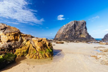 An aerial shot in late summer afternoon of Glasshouse Rocks Beach near Narooma, NSW, Australia