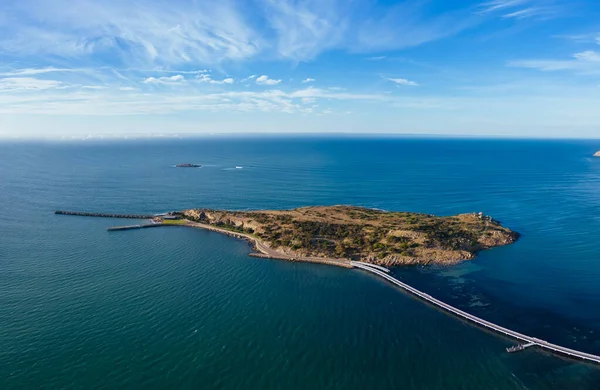 stock image An aerial view of the famous Granite Island Recreation Park and causeway in Victor Harbor on a sunny autumn day in South Australia, Australia