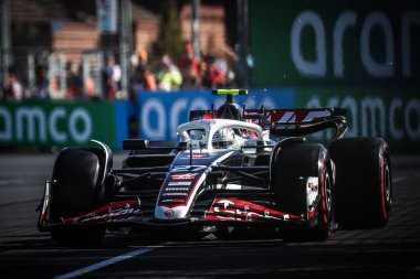 MELBOURNE, AUSTRALIA - MARCH 22: Nico Hulkenberg of Germany drives the Haas F1 VF-24 Ferrari during second practice in the 2024 Australian Grand Prix at Albert Park in Melbourne, Australia clipart