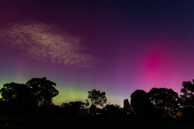 MELBOURNE, AUSTRALIA - MAY 12: Increased solar activity results in the rare Aurora Australis being visible in southerly areas of Australia. This image taken from Macleod in suburban Melbourne clipart