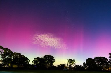 MELBOURNE, AUSTRALIA - MAY 12: Increased solar activity results in the rare Aurora Australis being visible in southerly areas of Australia. This image taken from Macleod in suburban Melbourne clipart