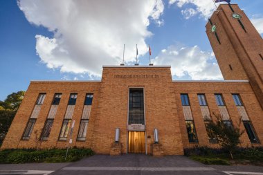 MELBOURNE, AUSTRALIA - MAY 05, 2024 - The beautiful art deco style building for The Centre Ivanhoe municipal building during autumn in Melbourne, Victoria, Australia clipart