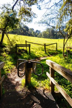 Mt Evelyn Aqueduct Trail Linear Reserve and surrounding landscape on a spring sunny day in Melbourne, Victoria, Australia clipart