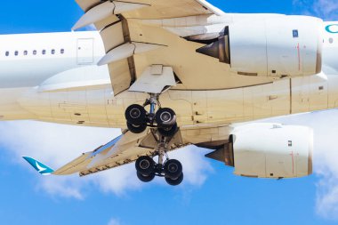 MELBOURNE, AUSTRALIA - SEPTEMBER 07, 2024: A Cathay Pacific Airbus A350-900 flies into Melbourne from Hong Kong on September 7th 2024 clipart