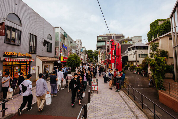 TOKYO, JAPAN - MAY 12, 2019 - Harajuku street life and shops near Cat St in central Tokyo, Japan