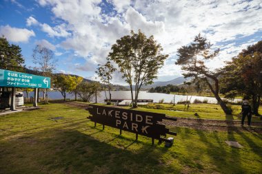 SHIRAKABA LAKE, JAPAN - SEPT 17, 2024: The township of Shirakaba Lake on a warm autumn afternoon on the famous Venus Line road, famous as a scenic driving route in Japan clipart