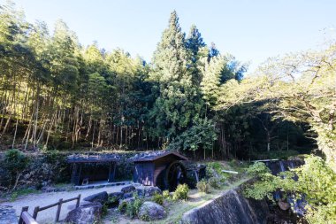 Hiking path landscape on the famous Magome-Tsumago Trail as part of the Nakasendo Way between Magome and Tsumago in Gifu Prefecture, Japan clipart