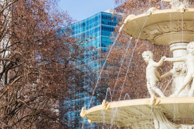 MELBOURNE, AUSTRALIA - AUGUST 1, 2024: Exhibition Fountain detail in Carlton Gardens on a clear sunny winters day in Melbourne Australia clipart