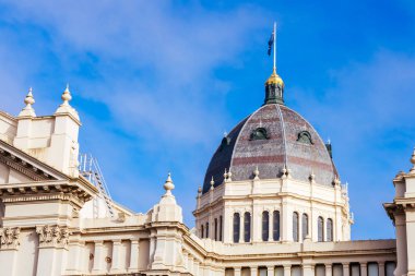 MELBOURNE, AUSTRALIA - AUGUST 1, 2024: Royal Exhibition Building in Carlton Gardens on a clear sunny winters day in Melbourne Australia clipart