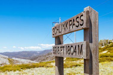 The summit of Schlink Pass on a clear summers day, in the Snowy Mountains, New South Wales, Australia clipart