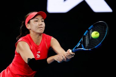 MELBOURNE, AUSTRALIA - JANUARY 12: Xinyu Wang of China plays Paula Badosa of Spain on day 1 of the 2025 Australian Open at Melbourne Park on January 12, 2025 in Melbourne, Australia. clipart