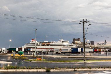 GEELONG, AUSTRALIA - FEBRUARY 02: An intense summer weather system passes over the Corio port for the Spirit of Tasmania on February 2, 2025. clipart