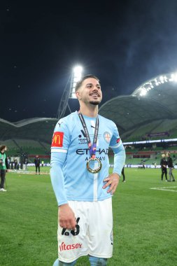 MELBOURNE, AUSTRALIA - 31 Mayıs: Melbourne City 'li Marco Tilio Melbourne City ile Melbourne City arasındaki A-League Erkekler Grand Final maçını kazandıktan sonra 31 Mayıs 2025' te, Avustralya 'nın Melbourne kentinde.