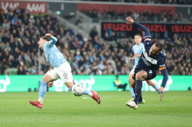 Melbourne City 'den Marco Tilio, Melbourne City' de 31 Mayıs 2025 'te Melbourne City ile Melbourne City arasındaki A-League Mens Grand Final karşılaşmasında Melbourne City' li Roderick Miranda ile çatıştı.