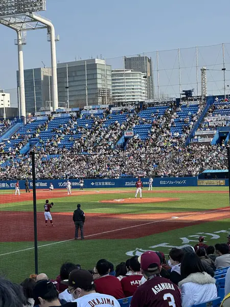 stock image Tokyo, Japan - 16 Mar 2024: Baseball player playing the match in the stadium filled with fans. Yakult Swallows v/s Rakuten Eagles.