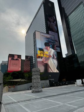 Seoul, South Korea - 10 Aug 2024: Shinsegae banner on buildings near COEX Mall clipart