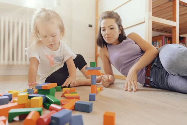 Bright Light Colored Room Mother Daughter Play Colorful Wooden Constructions — Stockfoto